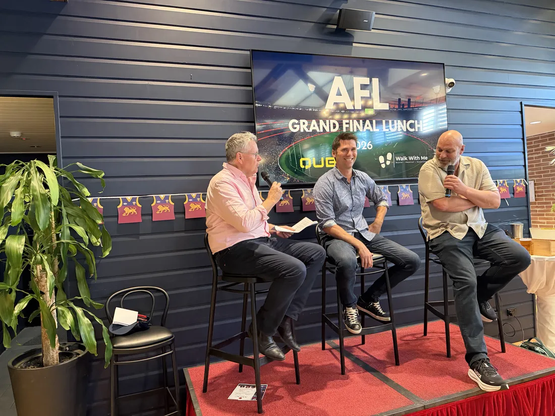 Speakers in conversation on stage at the Brisbane lunch