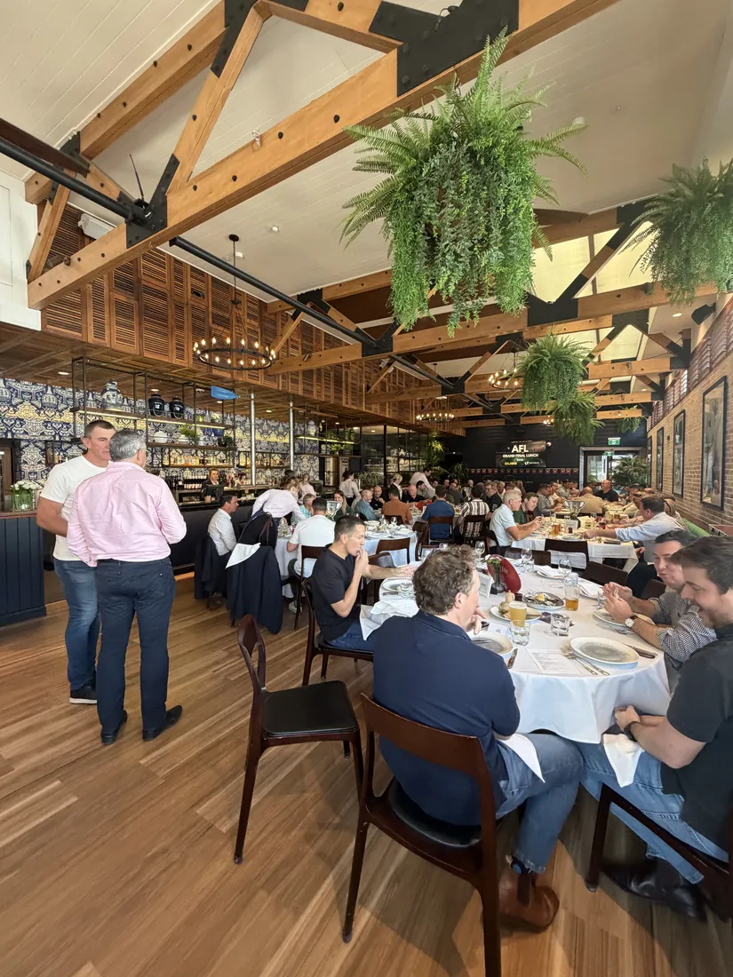 Guests at long tables during the Brisbane lunch