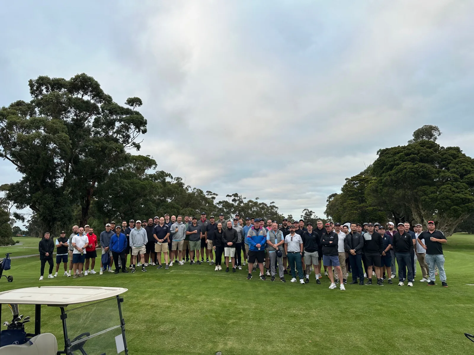 4QTR golf day guests gathered together on the course