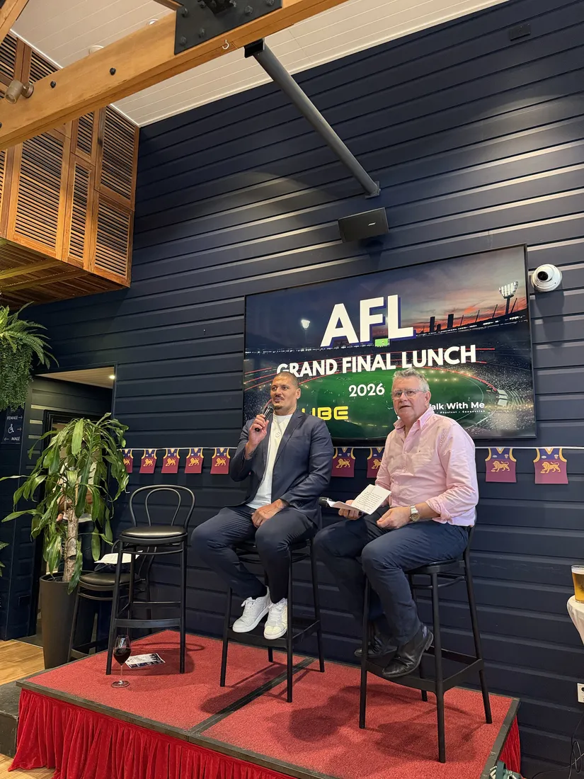 Two speakers in conversation on stage at the Brisbane event