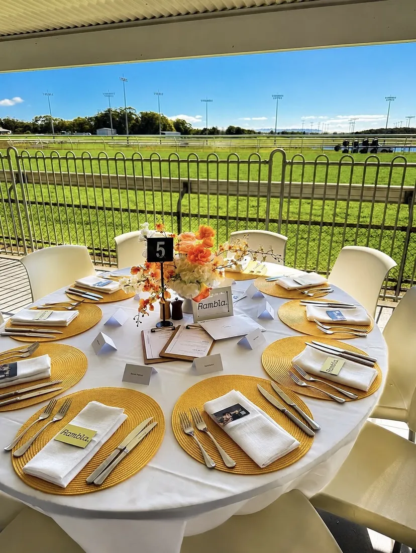 Guests dining with a view of the track at Sunshine Coast Turf Club