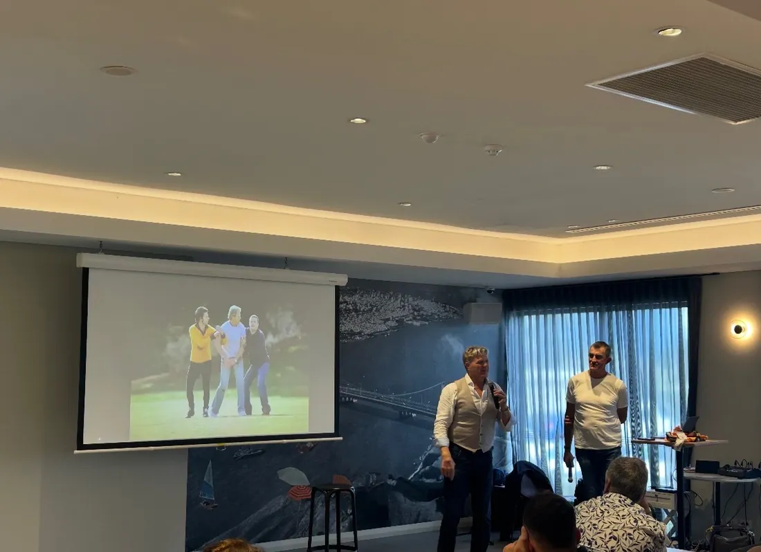 Two speakers on stage at the Perth event
