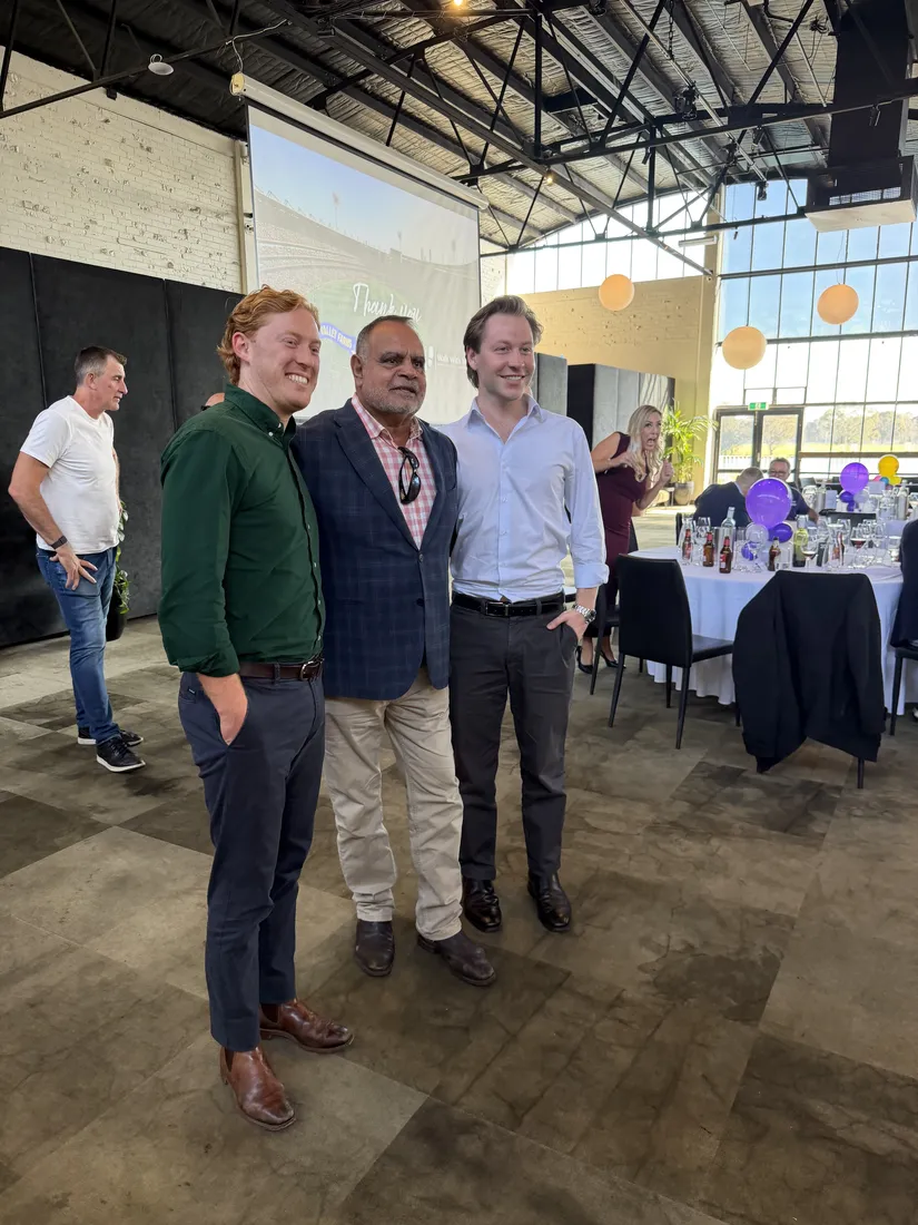 Guests posing together at the event